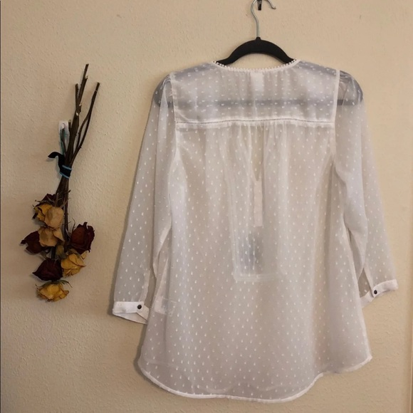 Sheer white blouse. 100% polyester. - Picture 3 of 5